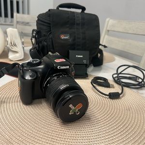 Canon EOS Rebel T3 Digital SLR Camera! with a Lowepro camera case